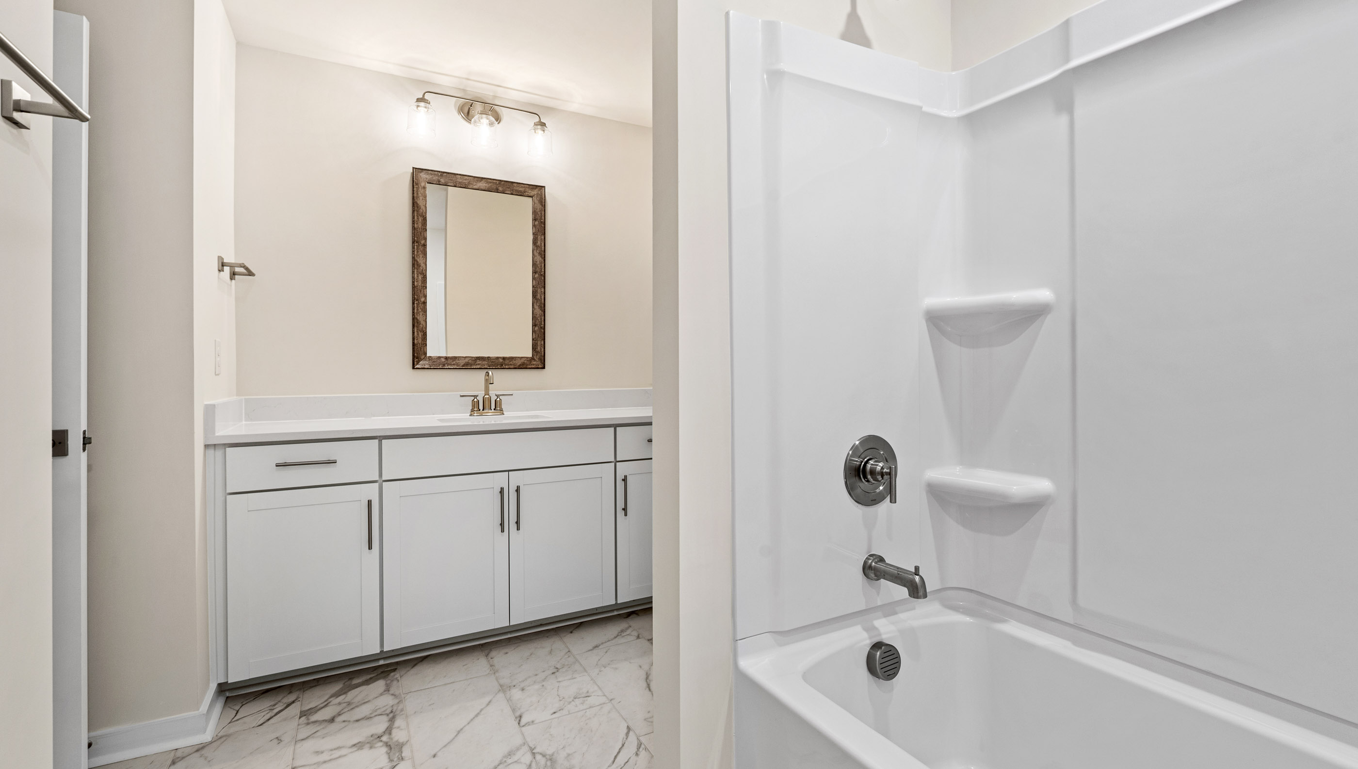 Separate shower and toilet area from vanity area.