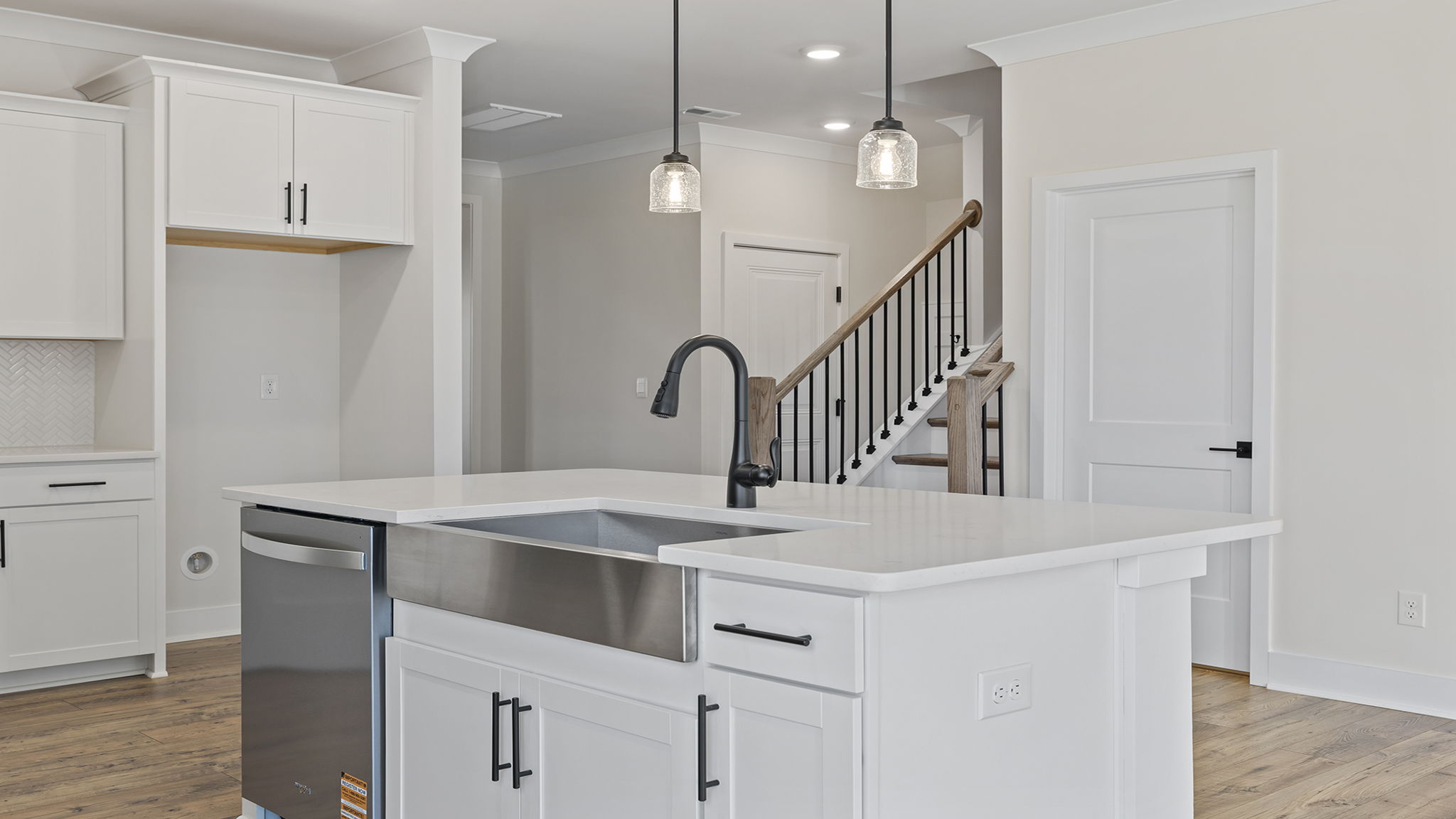 Island hosts the sink and dishwasher.