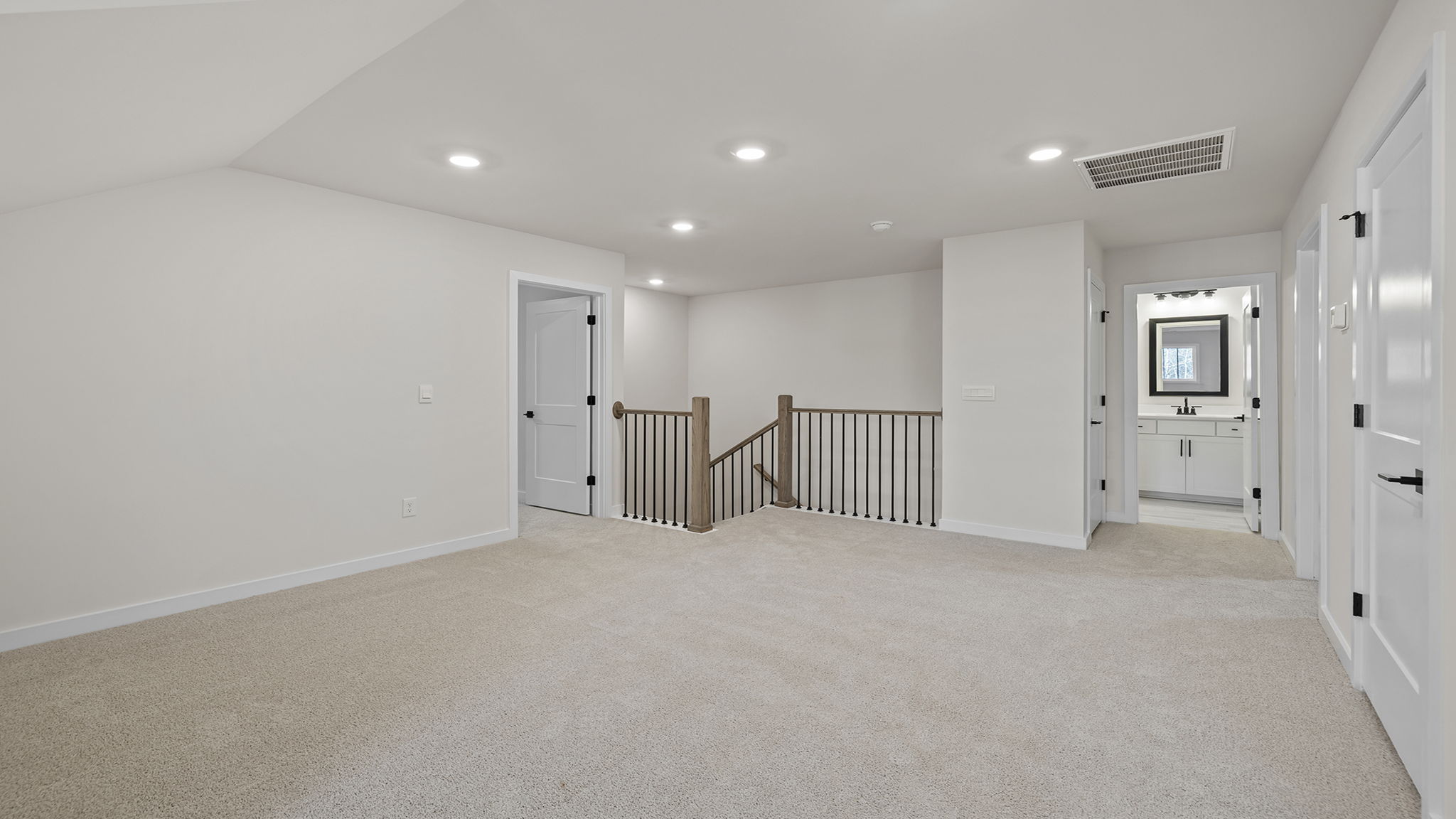 Landing of stairwell and loft area.