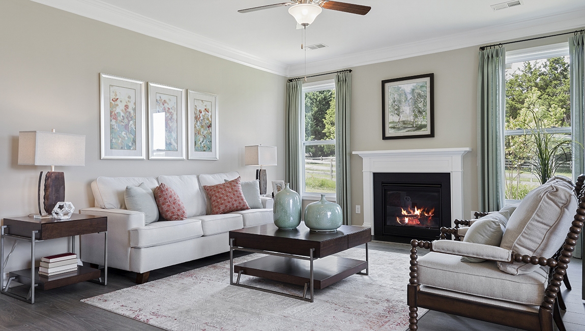 Family room with fireplace and window