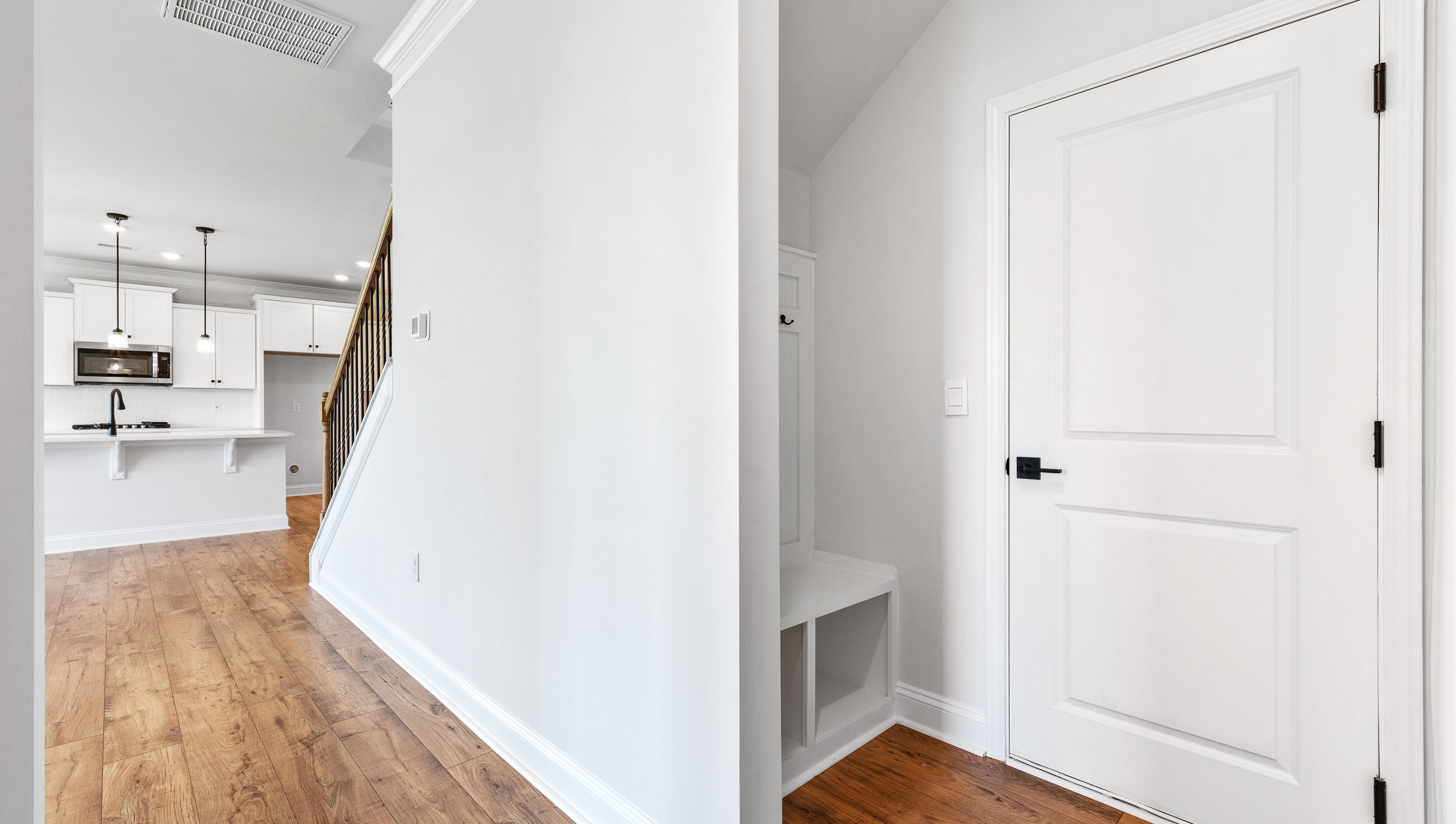 Storage space under the stairs.