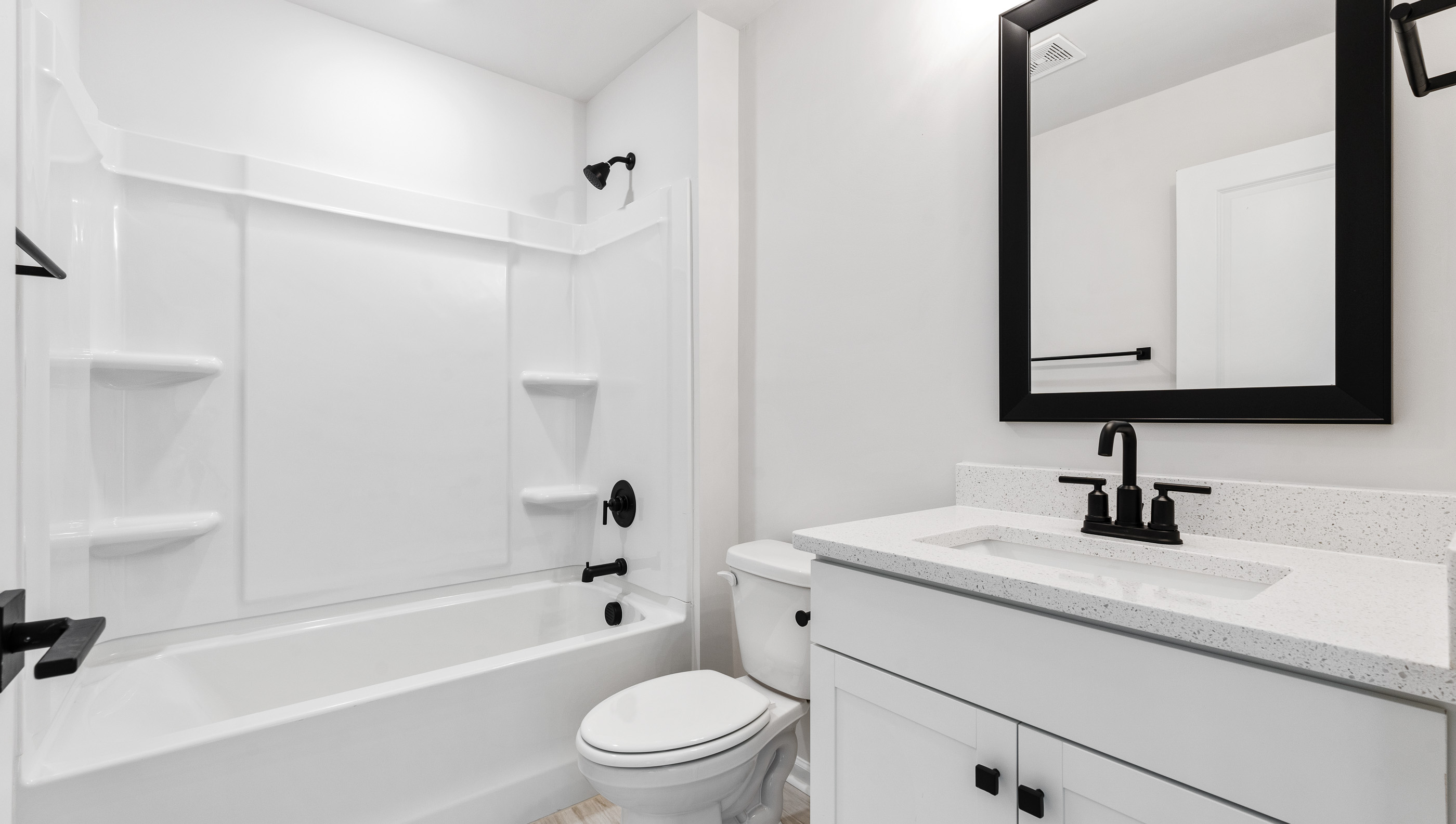 Bathroom with tub and sink.