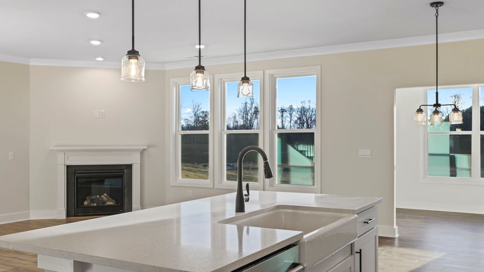Kitchen with island and cabinets.
