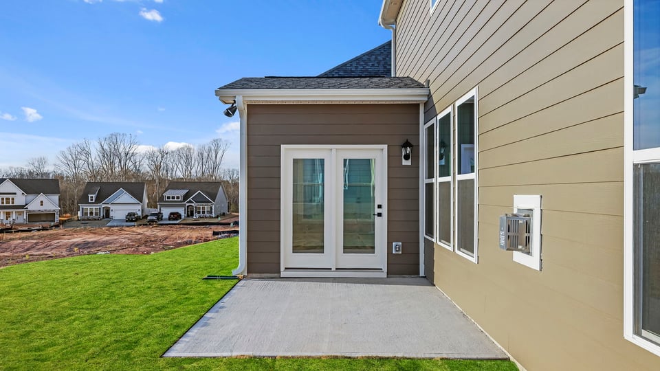 Back patio with large backyard.