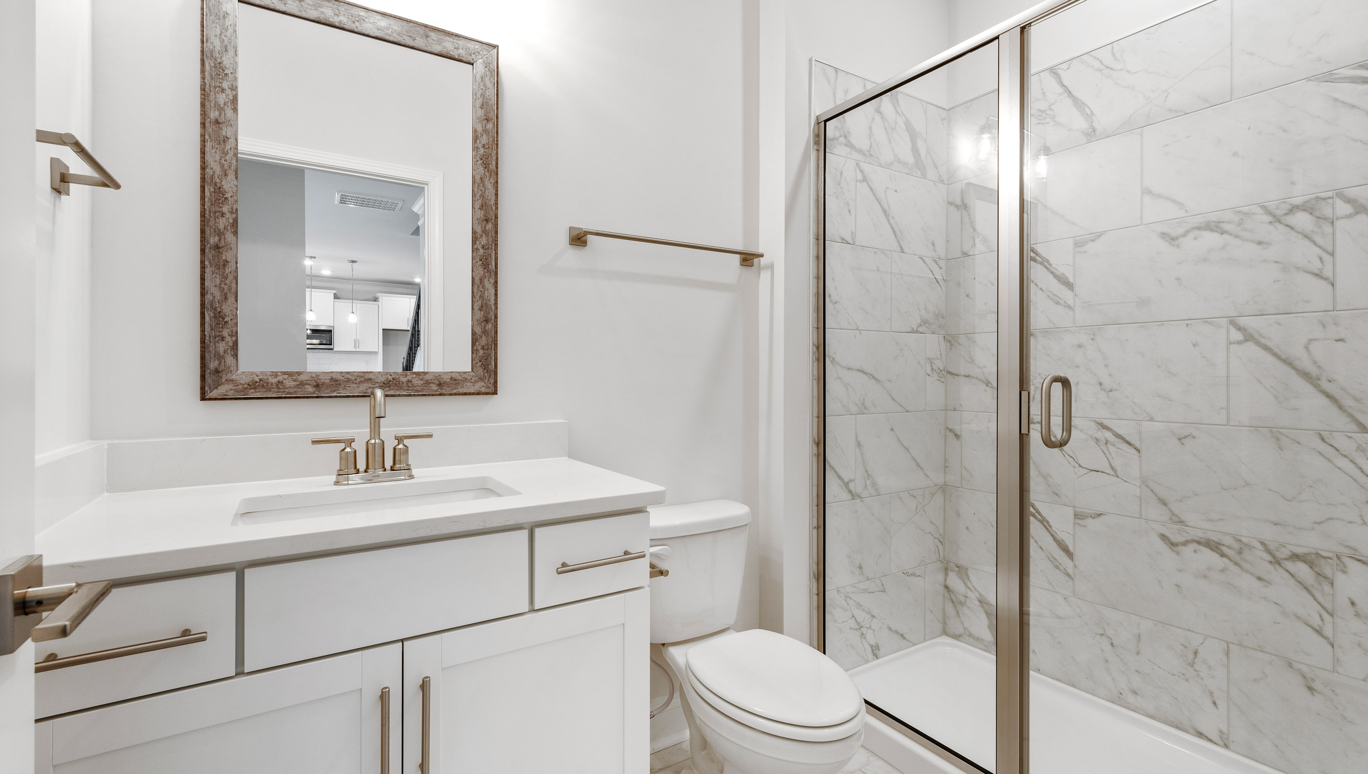 One of two hall bathrooms.