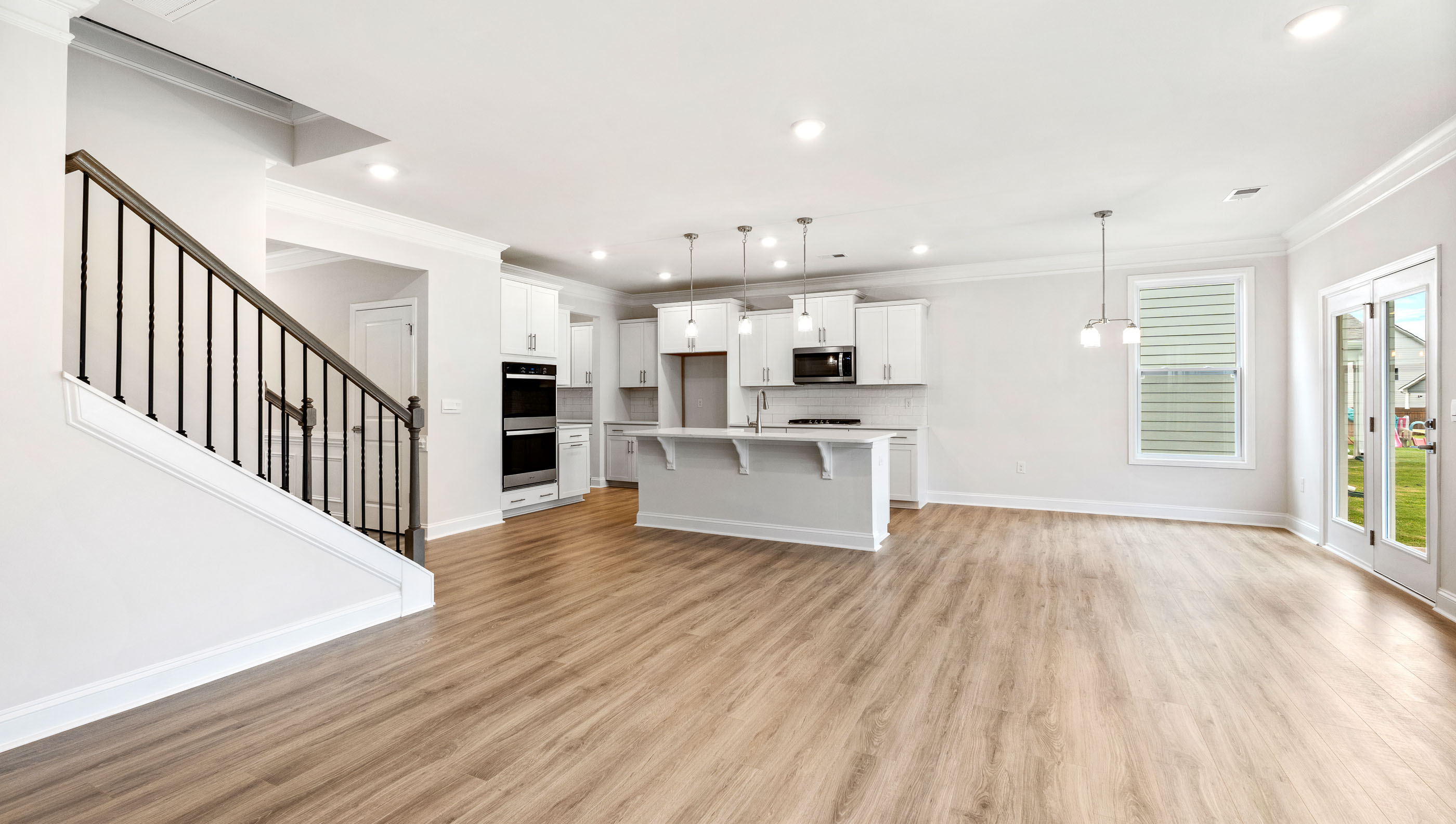 Family room with view of stairs.