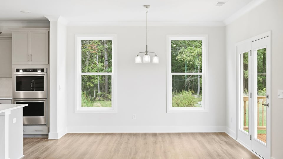 Kitchen with island and cabinets.