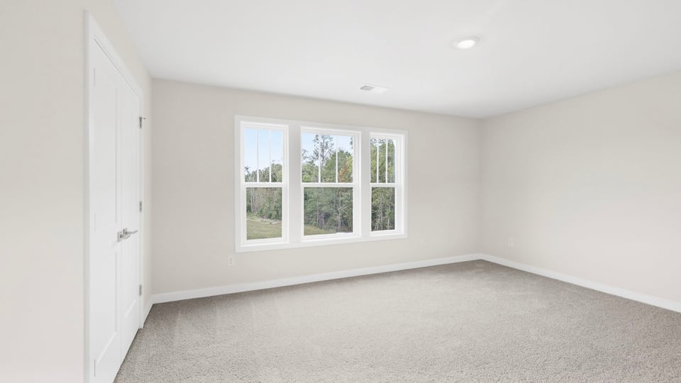 Loft area with windows.