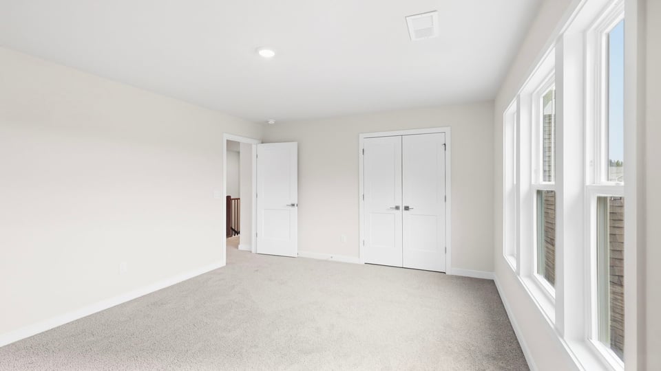 Loft area with windows.