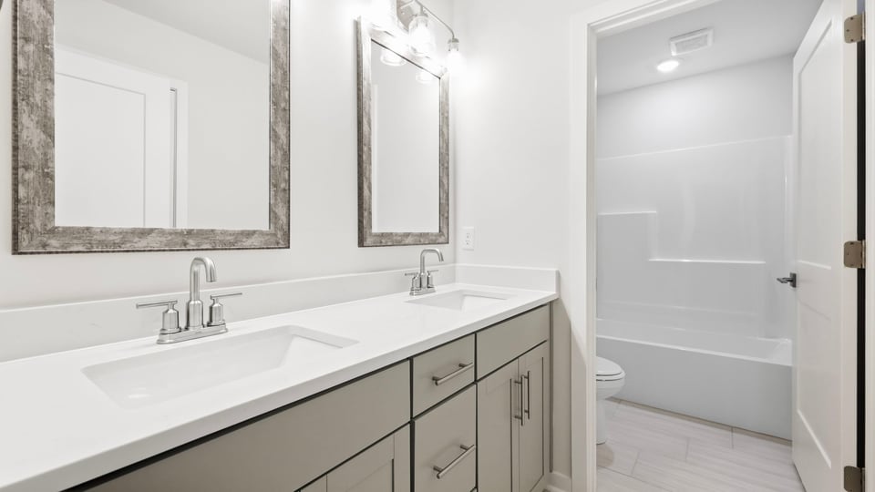 Bathroom with double vanity sinks.