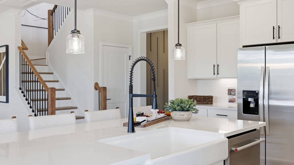 Kitchen with island and cabinets.