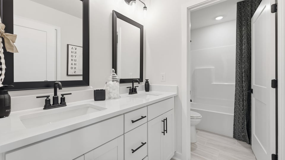 Bathroom with double vanity sink.