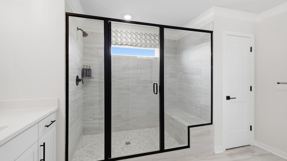 Primary bathroom with double vanity sink.