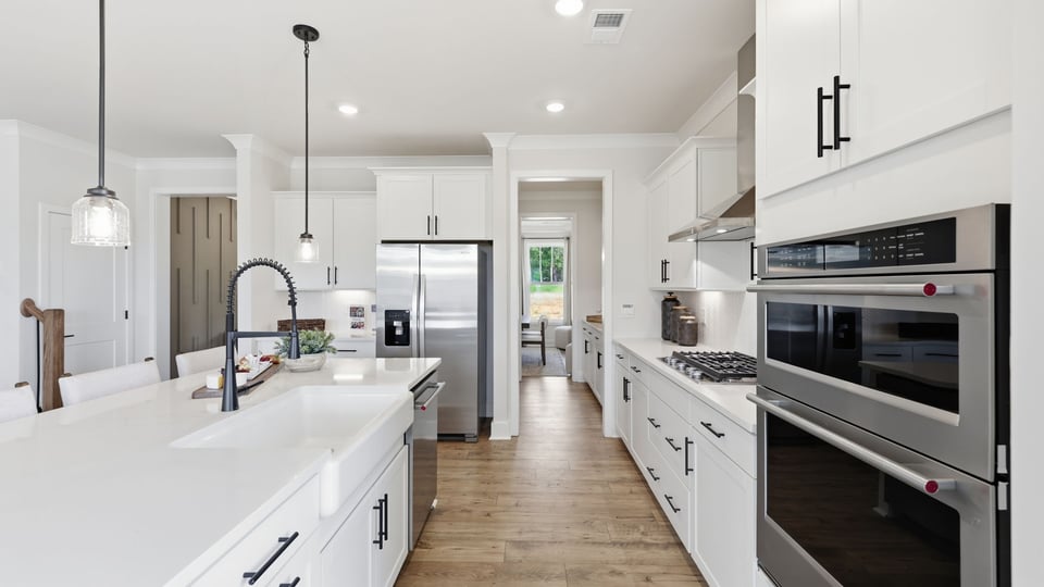 Kitchen with cabinets and island.