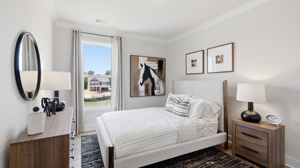 Bedroom with window and closet.