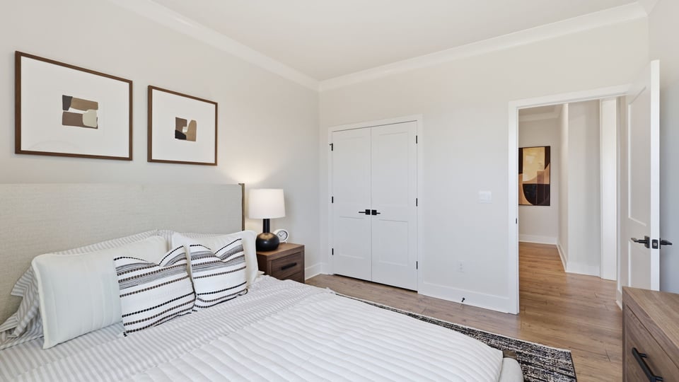 Bedroom with window and closet.