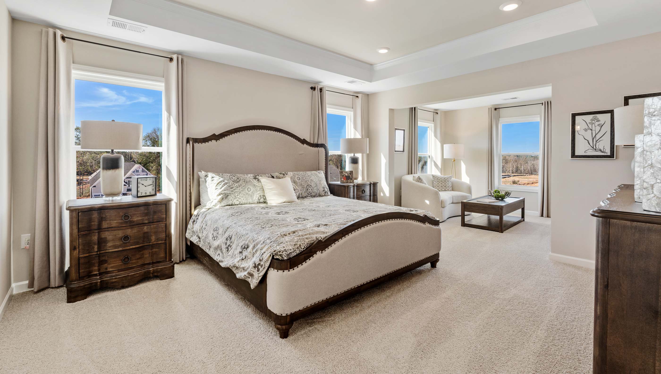 Bedroom with carpet and window.