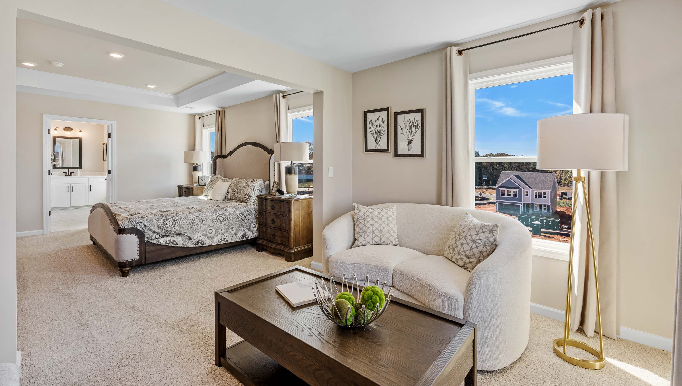 Bedroom with carpet and window.