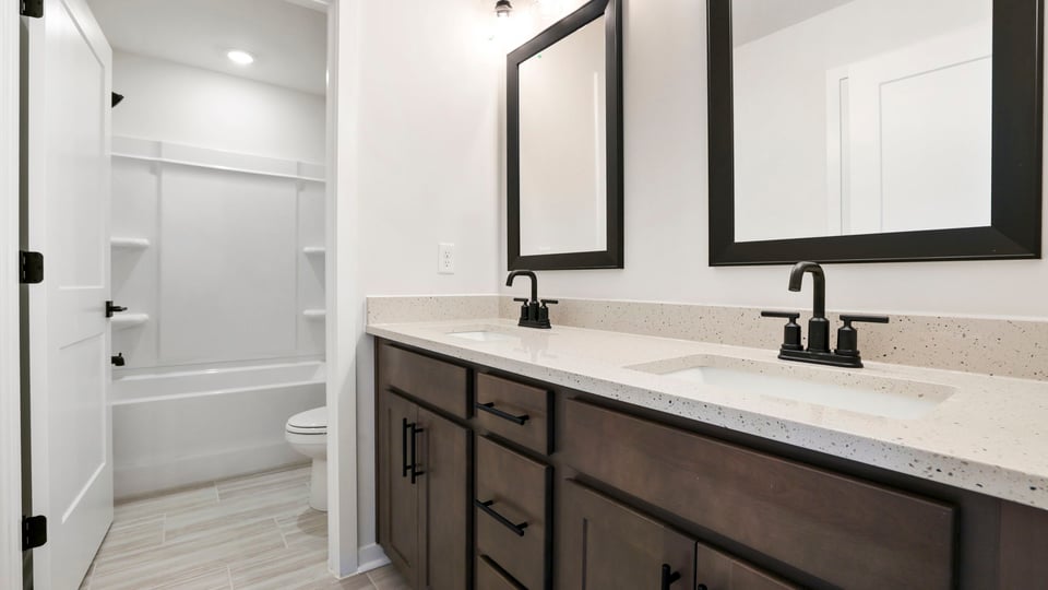 Bathroom with double vanity sinks.