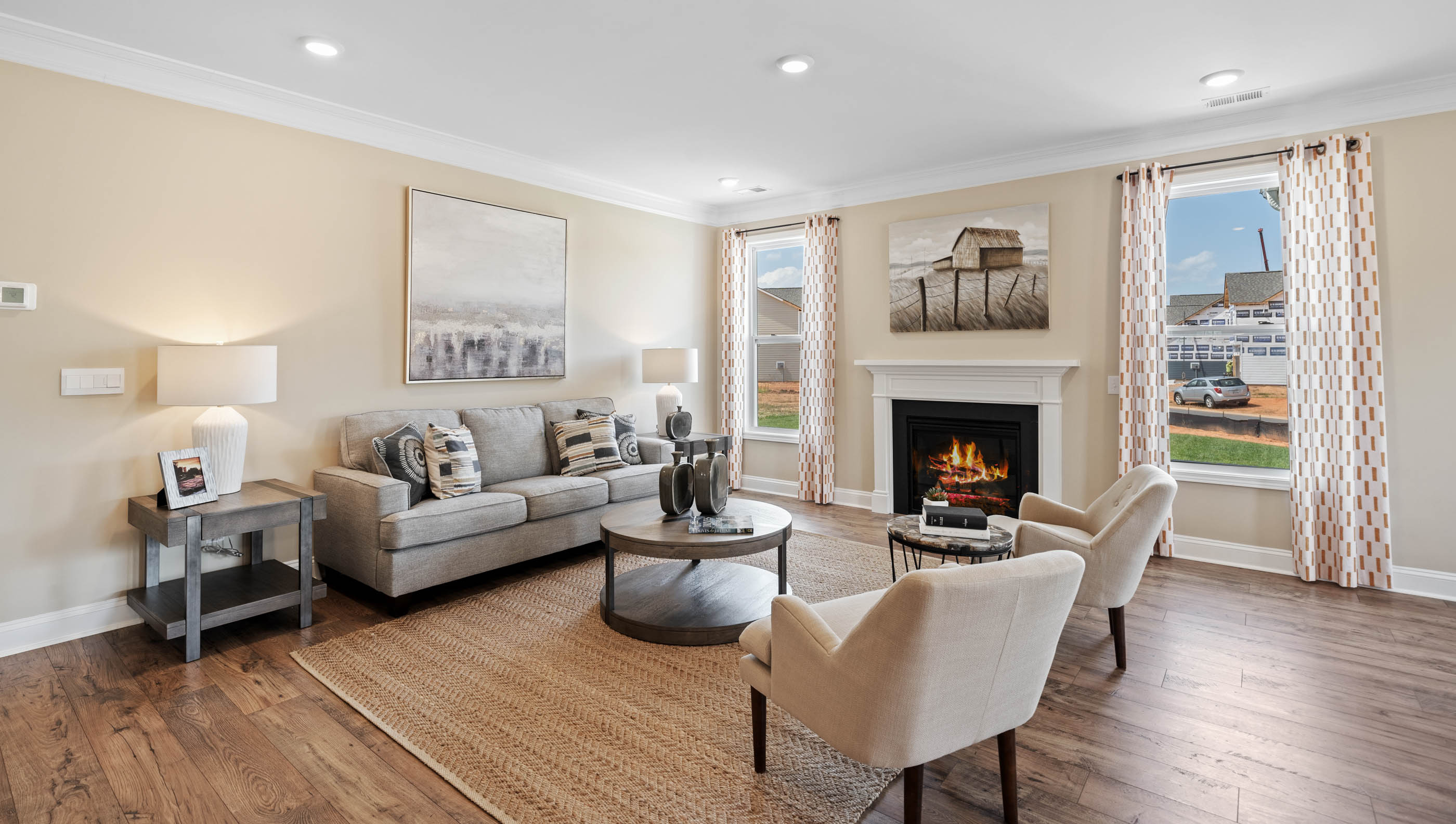Family room with fireplace and windows.