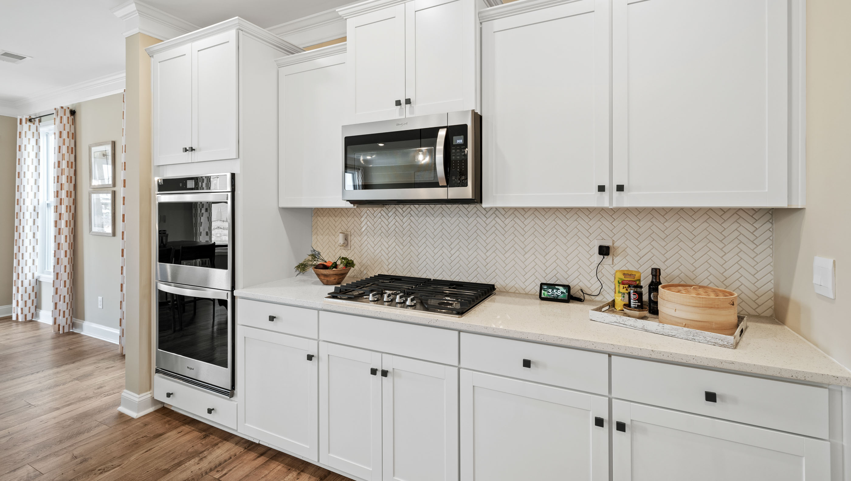 Kitchen with white cabinets.
