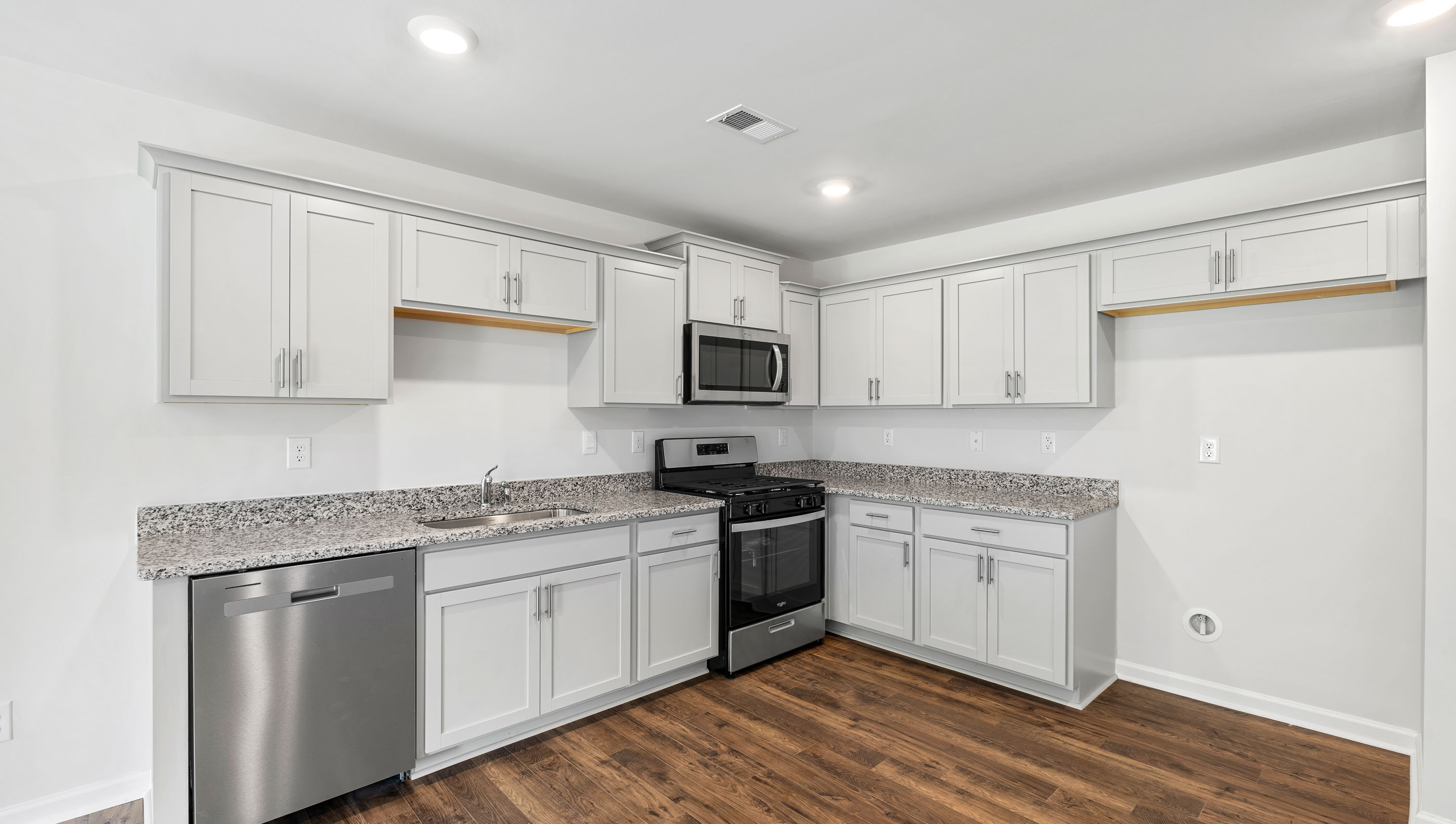 Kitchen with stainless steel appliances.