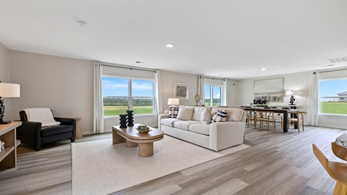 Family room with windows.