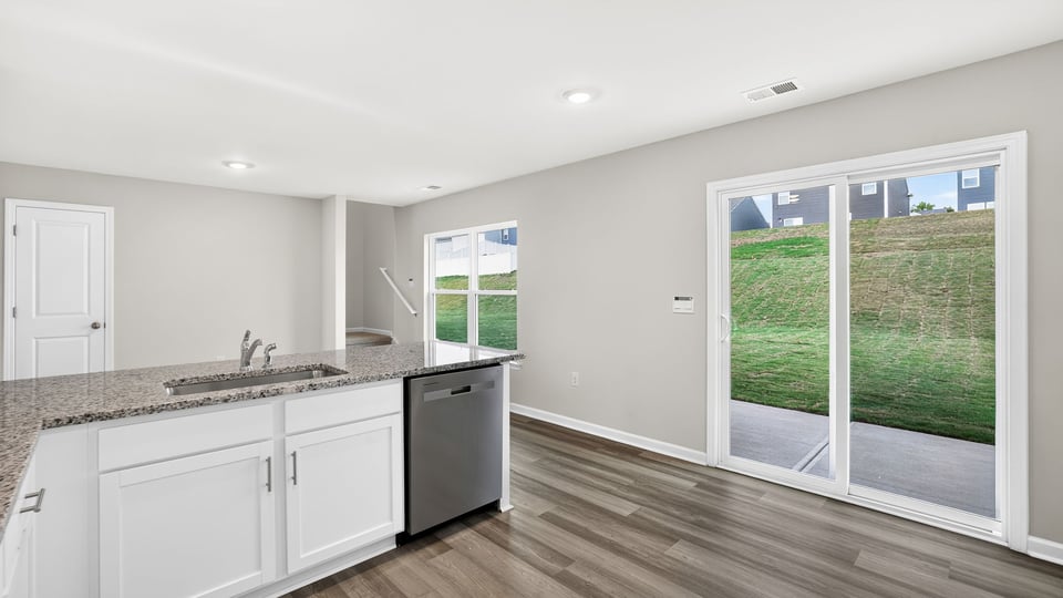 Kitchen with island and countertops.