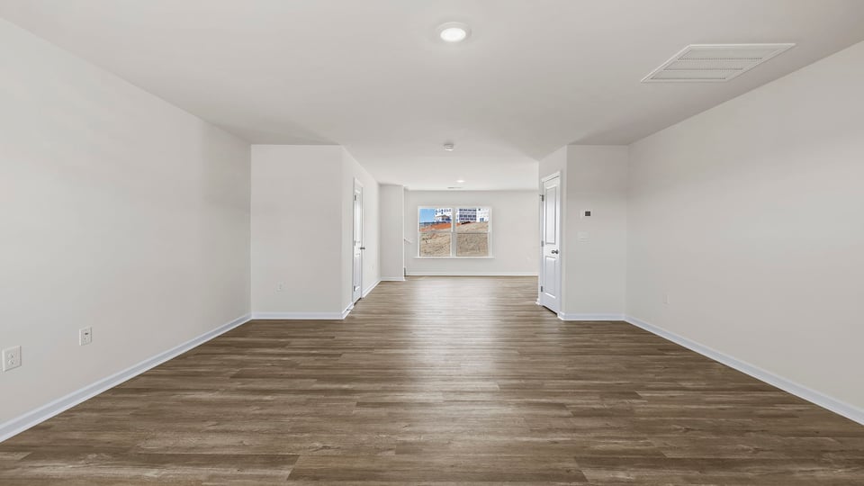 Family room looking towards rear of home.