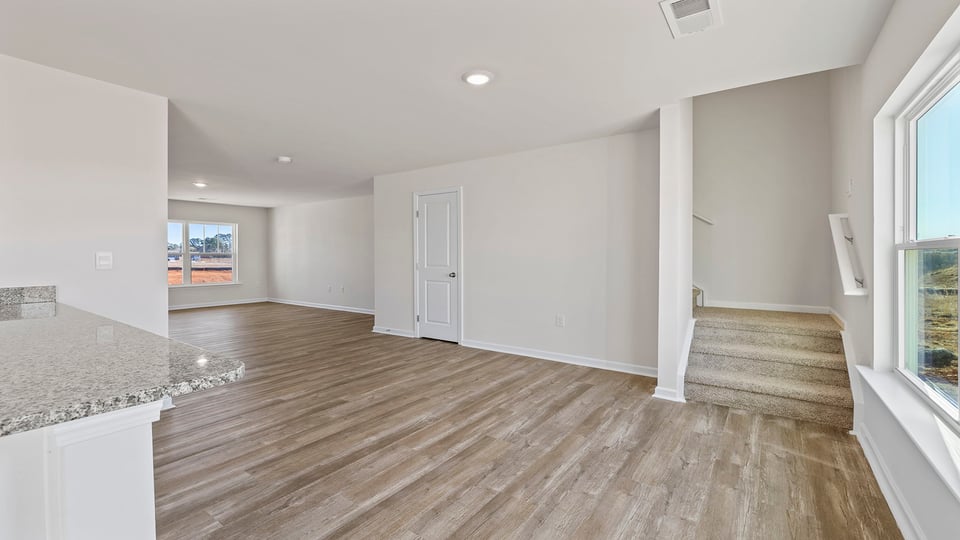 Dining room and stairs to second level.