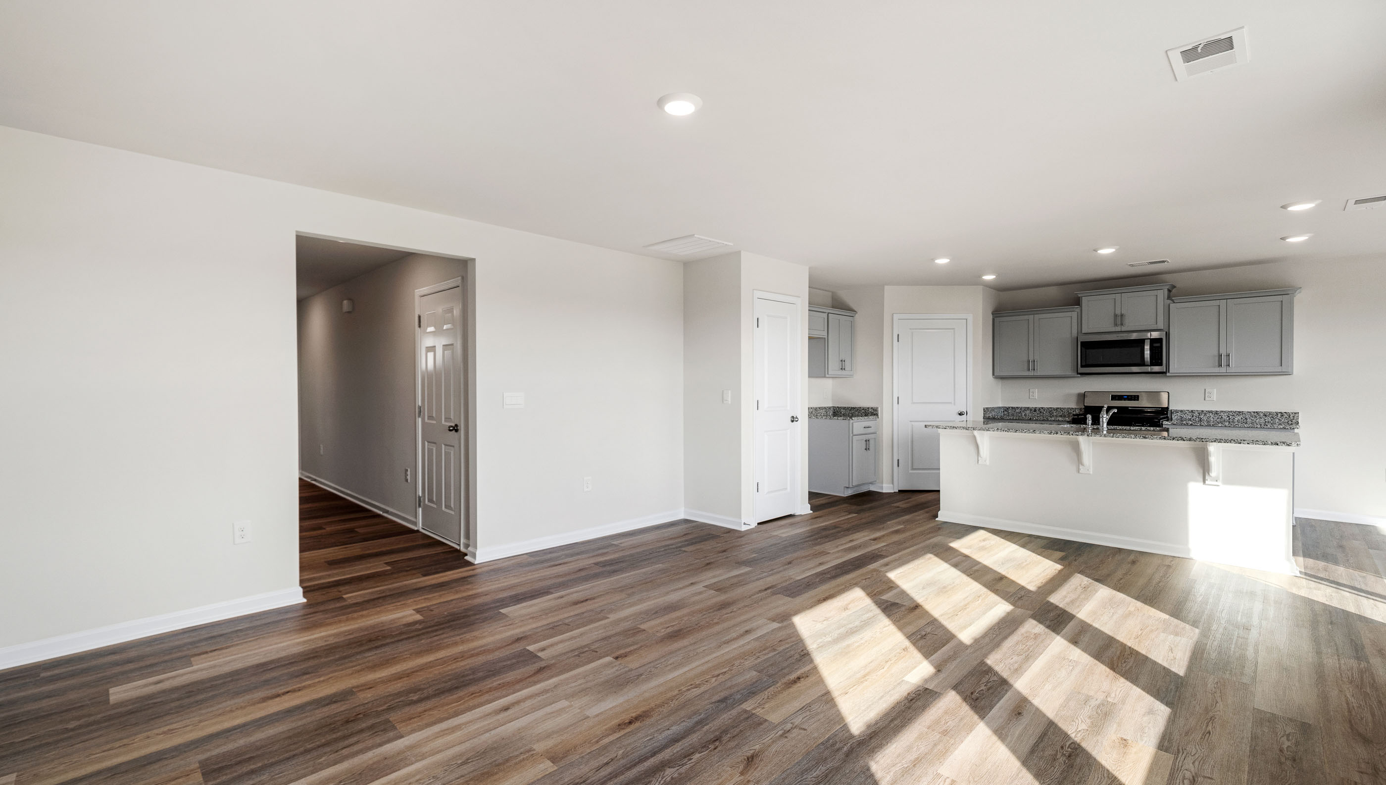Family room with windows.