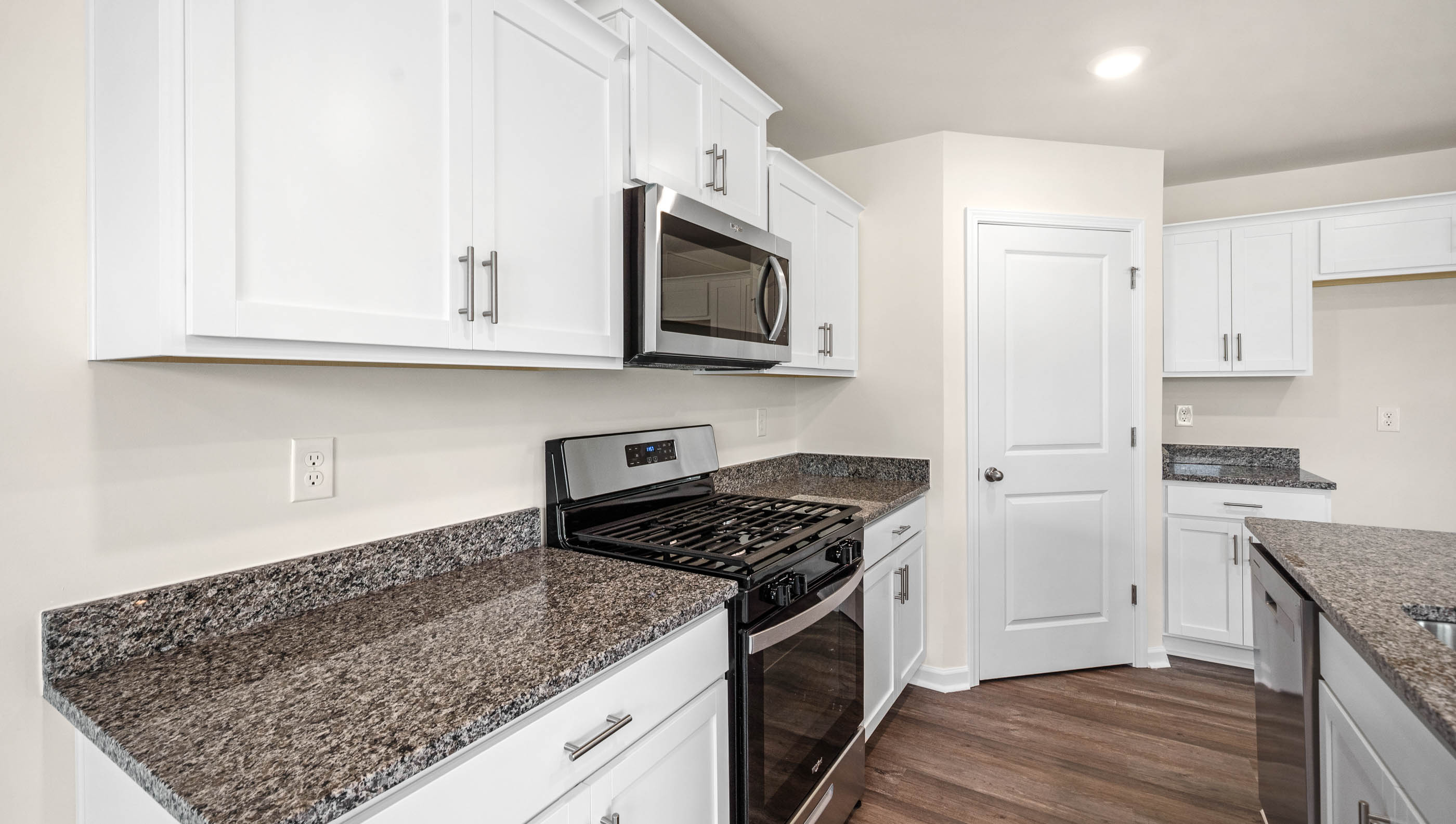 Kitchen with island and countertops.