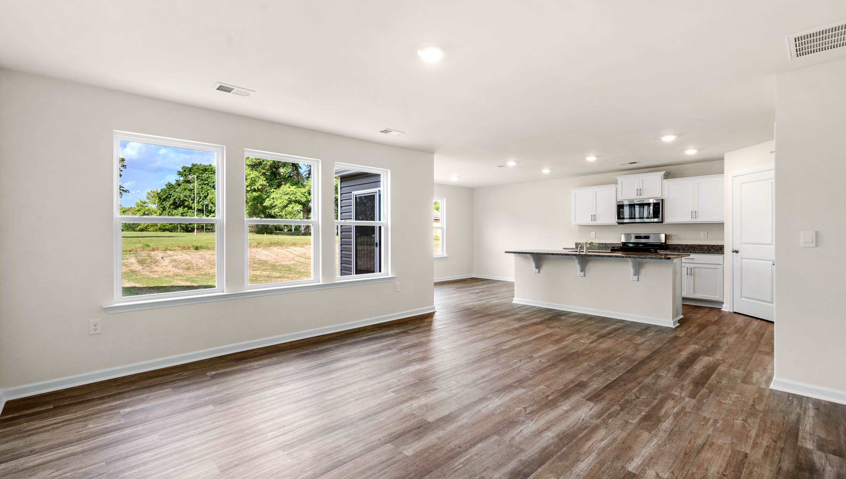 Kitchen with island and countertops.