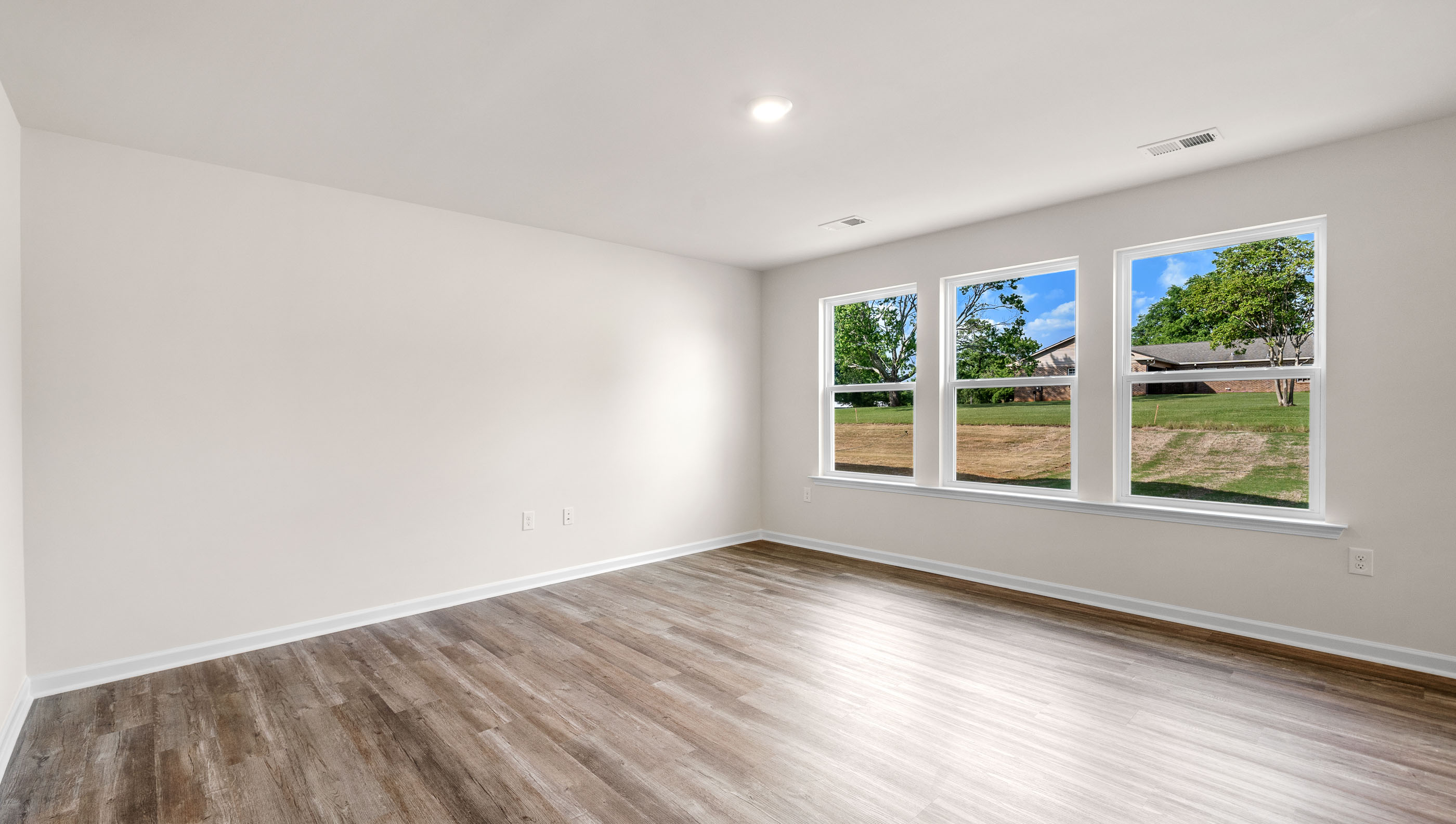 Livingroom with large backyard.