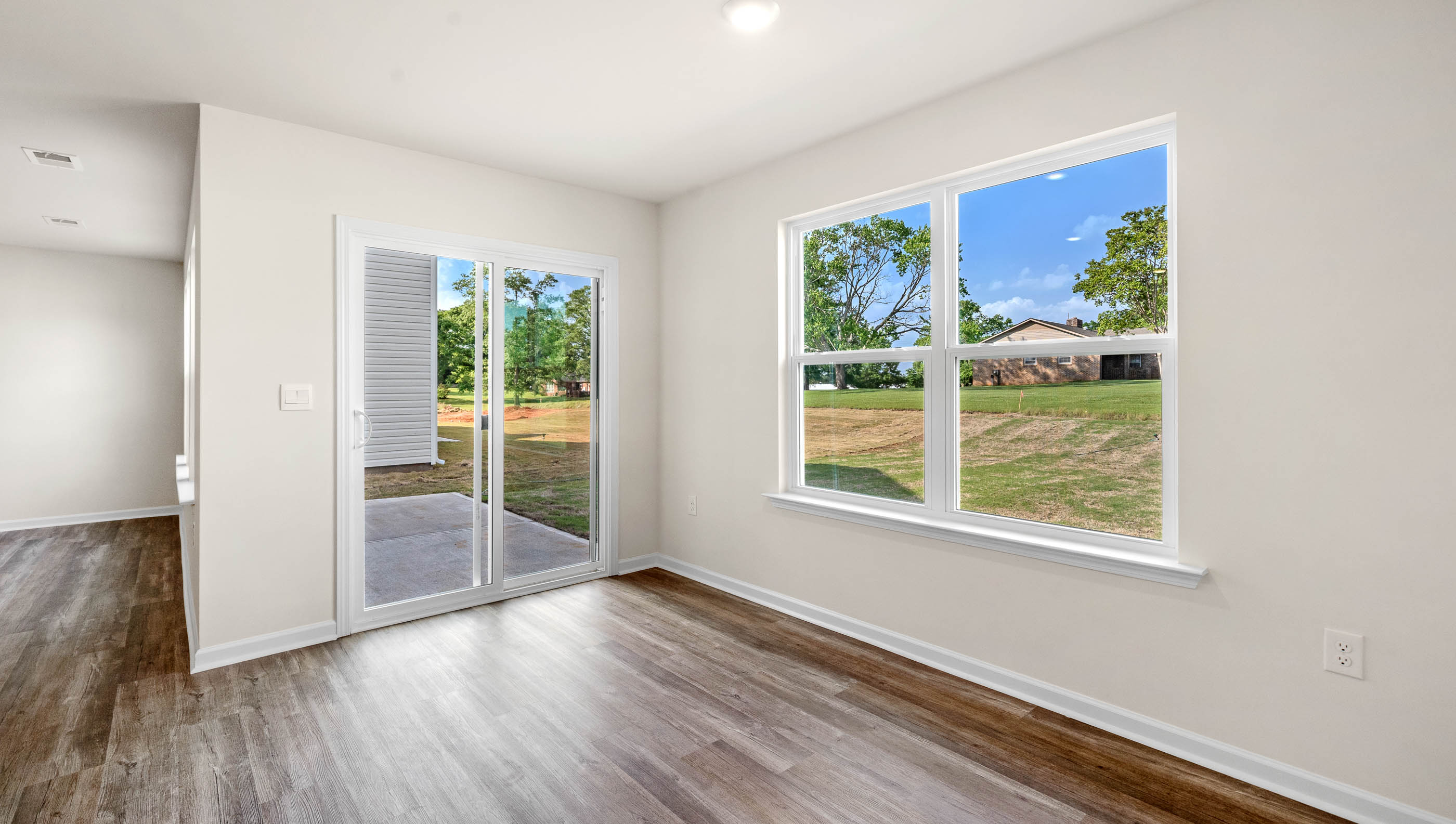 Livingroom with large backyard.
