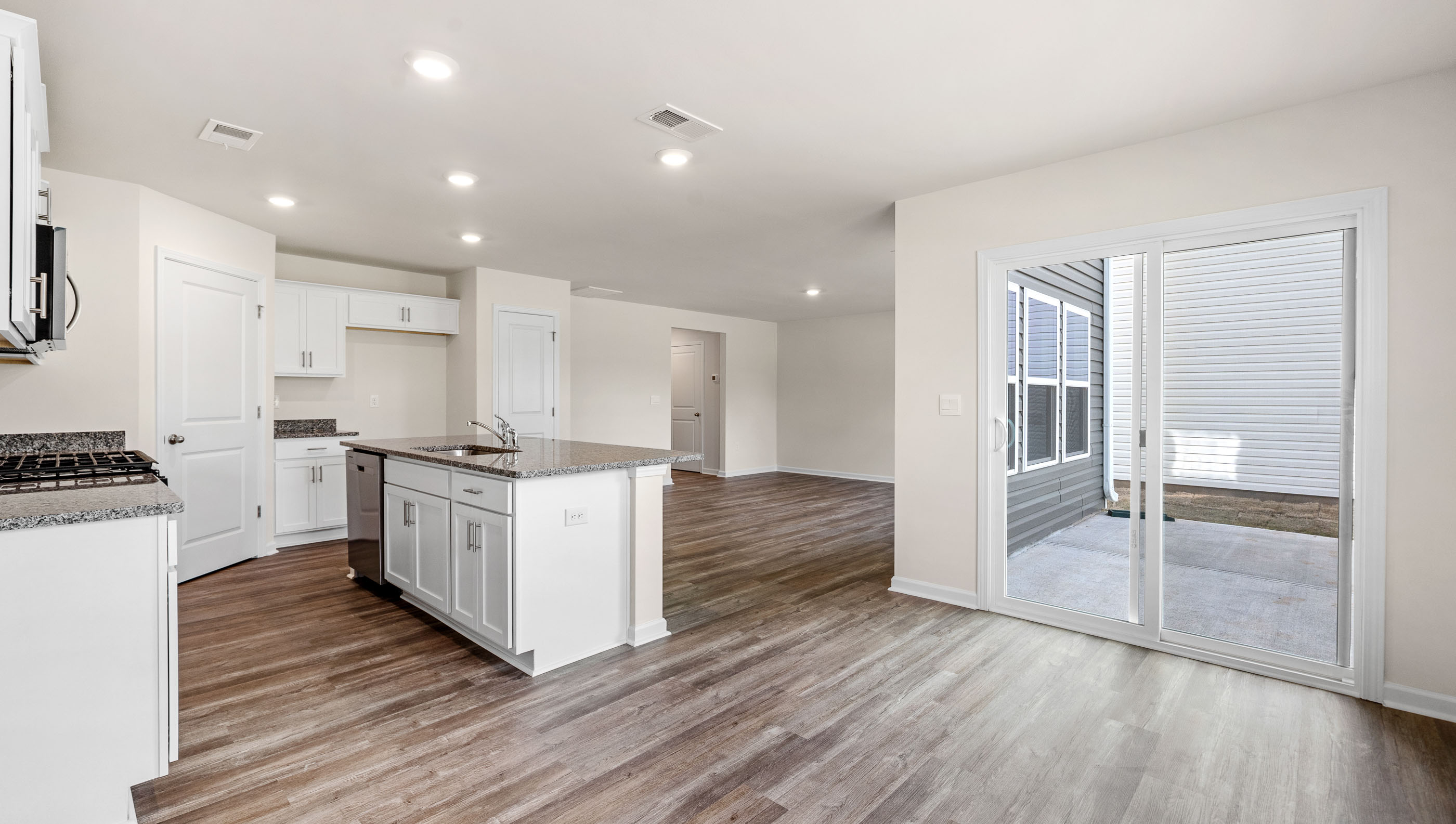 Kitchen with island and countertops.