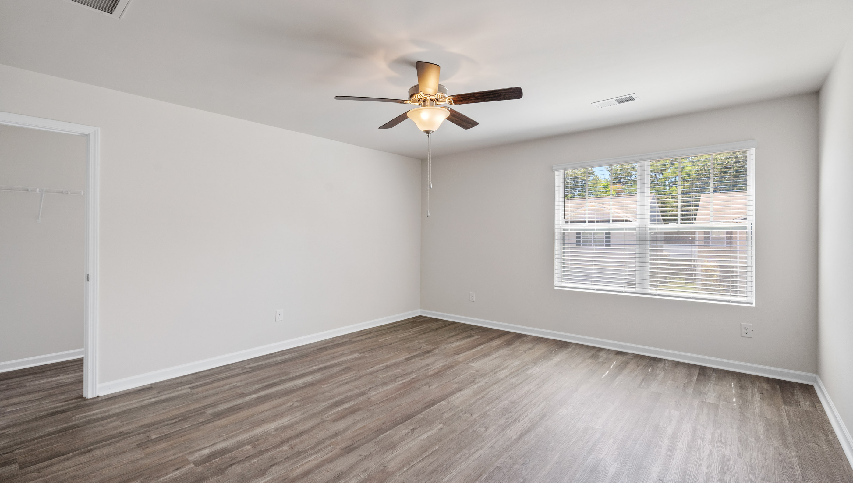 Bedroom 3 with large window.
