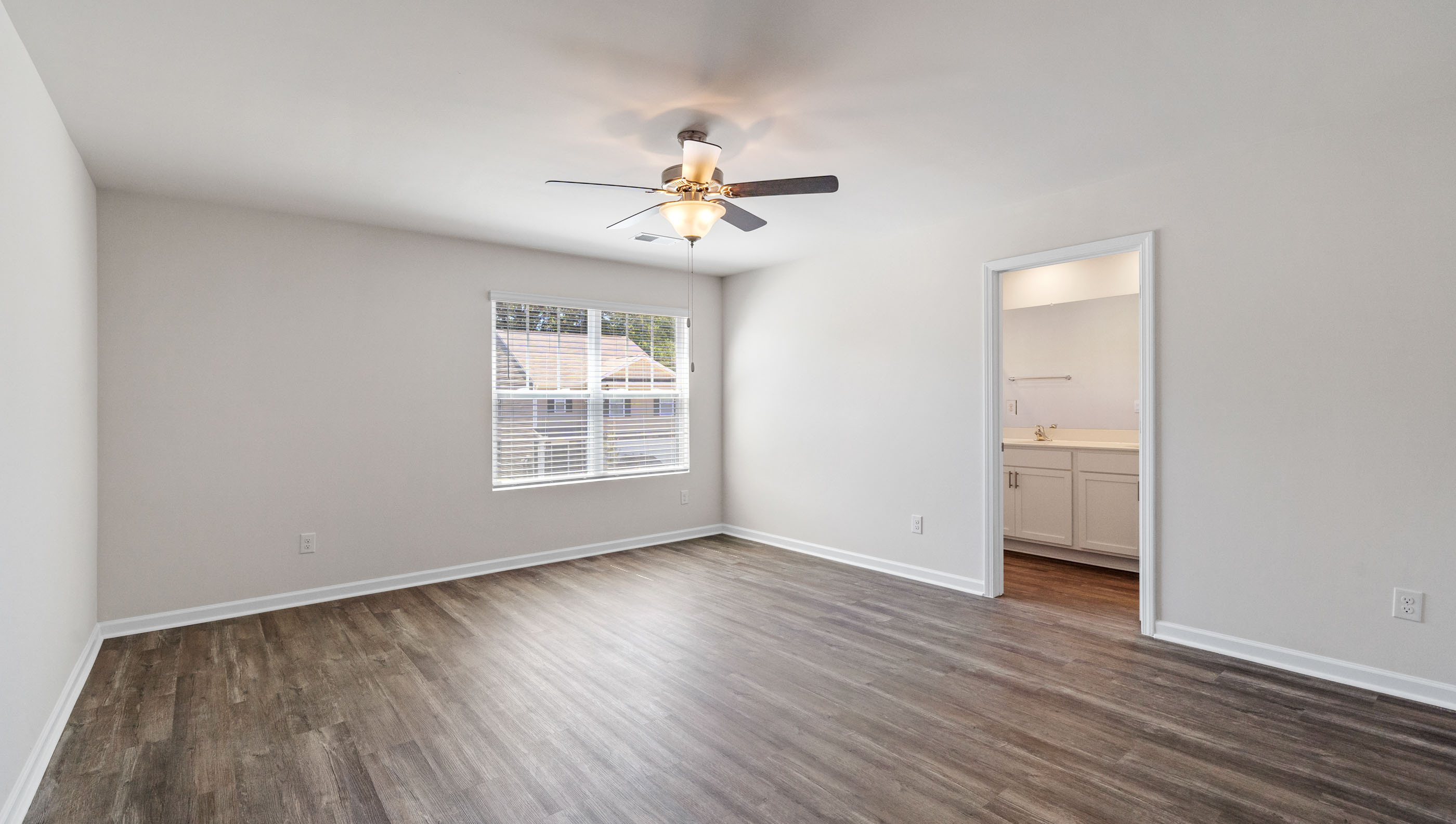 Bedroom 3 with large window.