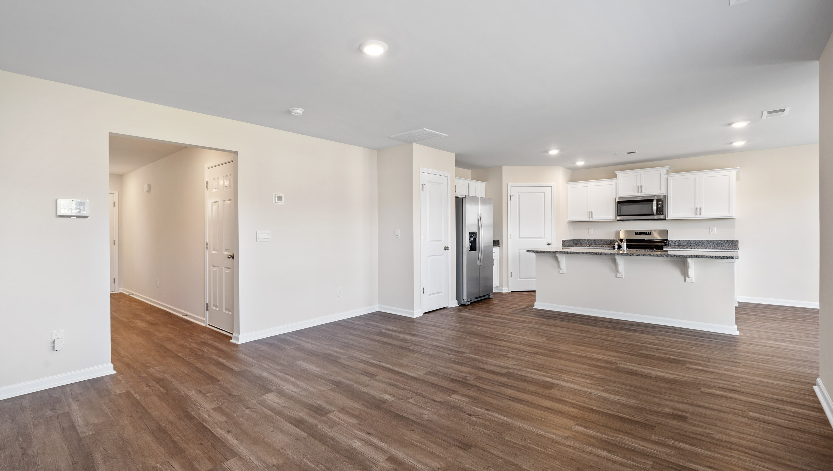 Living toom view of kitchen.