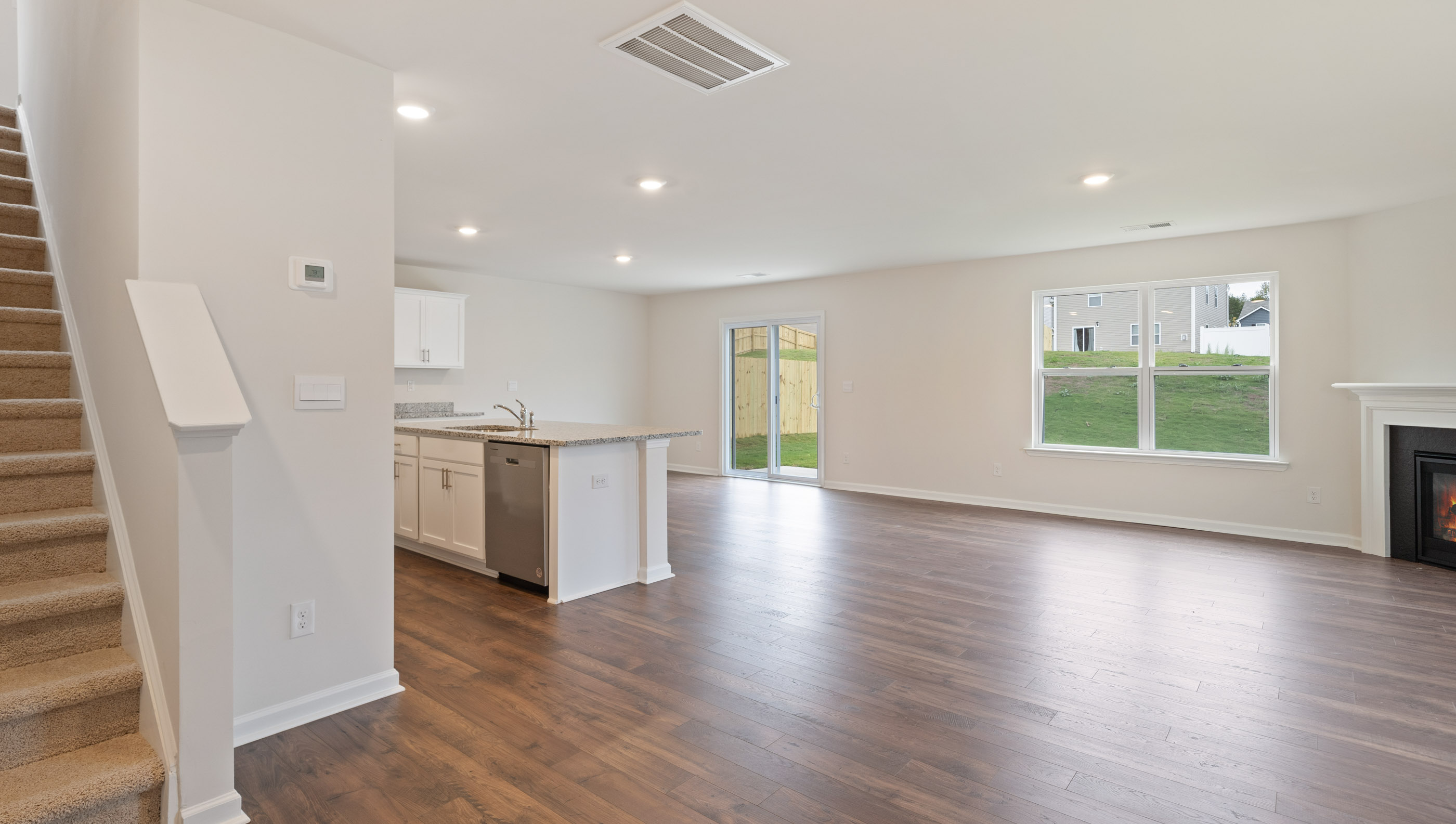 Family room with view of stairs.