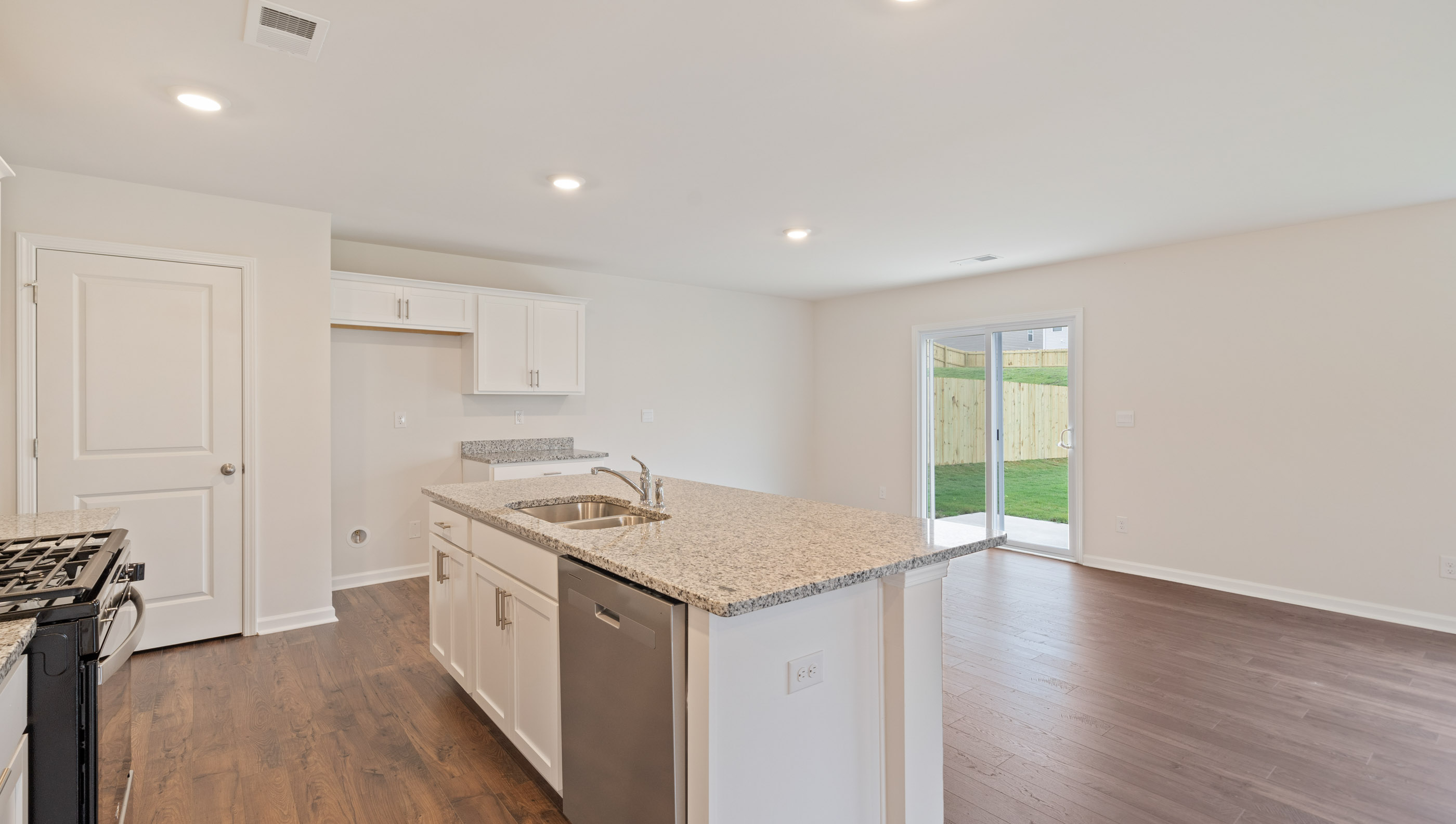 Kitchen and island with granite counter tops/