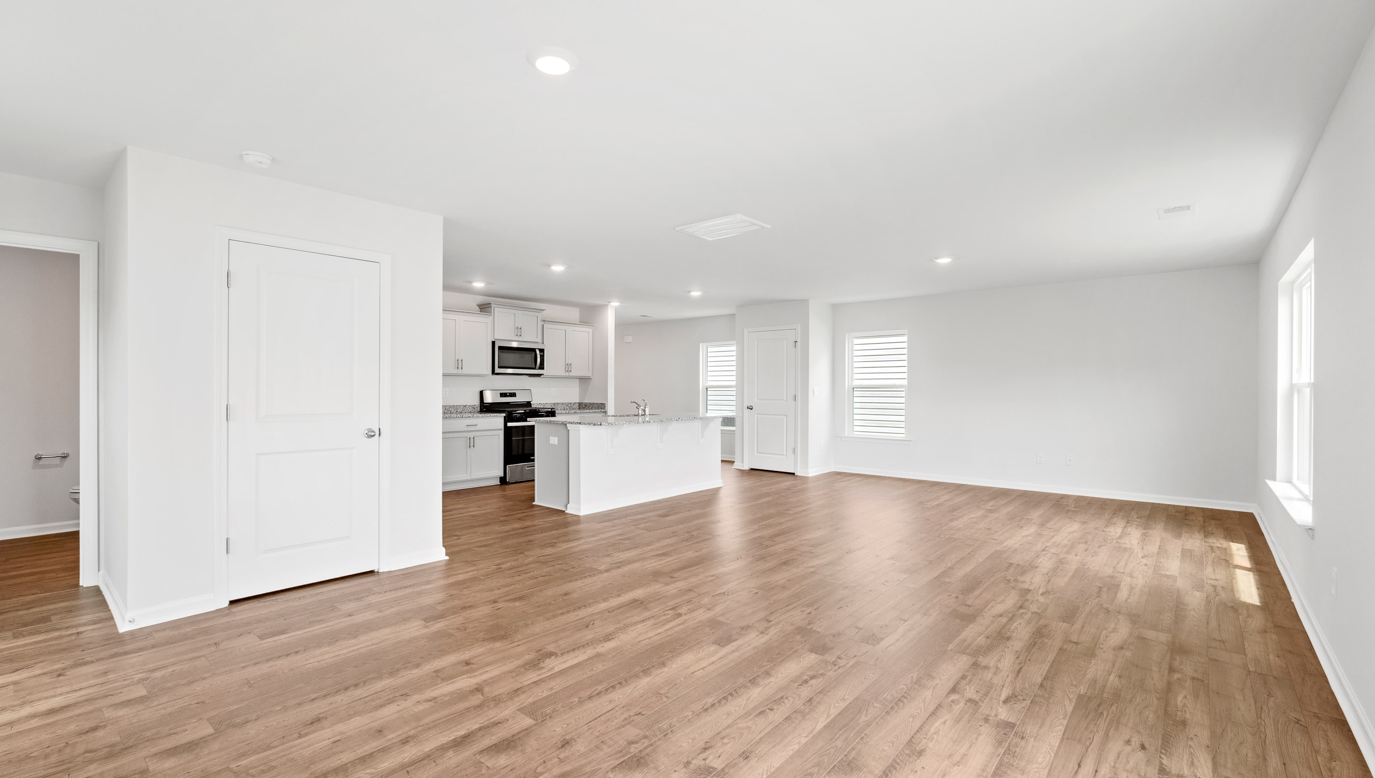 Family room with windows.