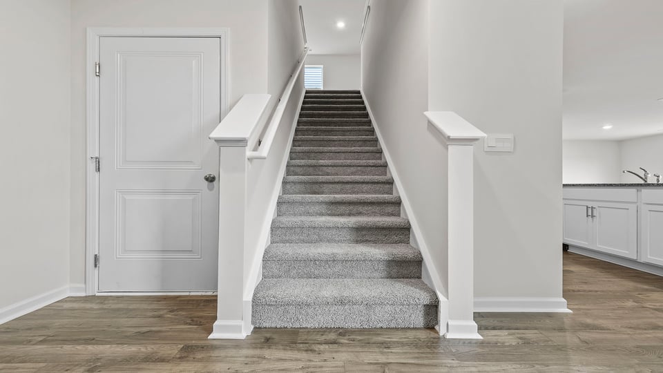 Stairs to second level.