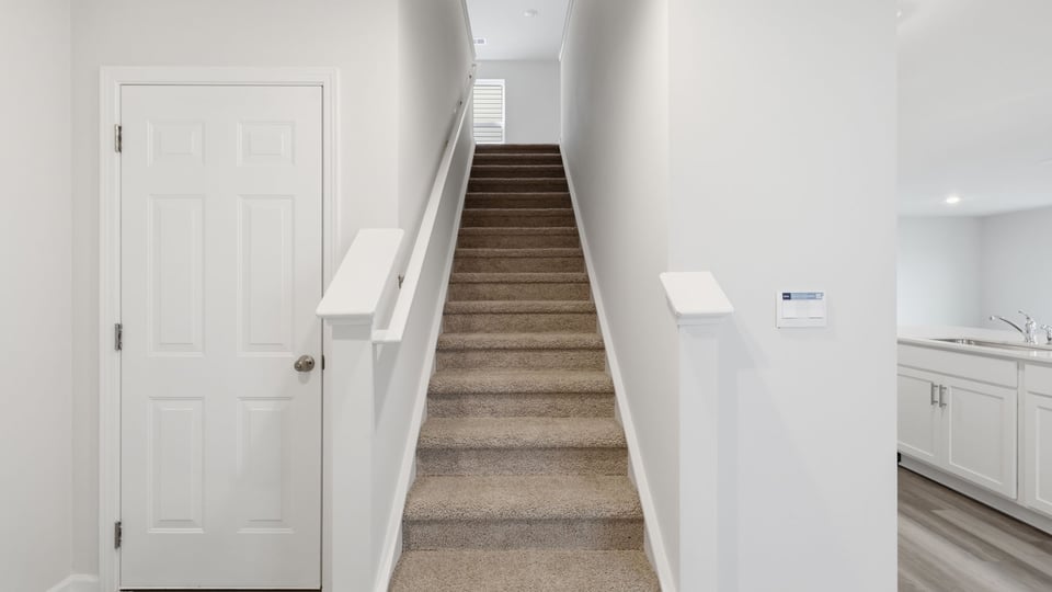 View of stairs to bedroom.