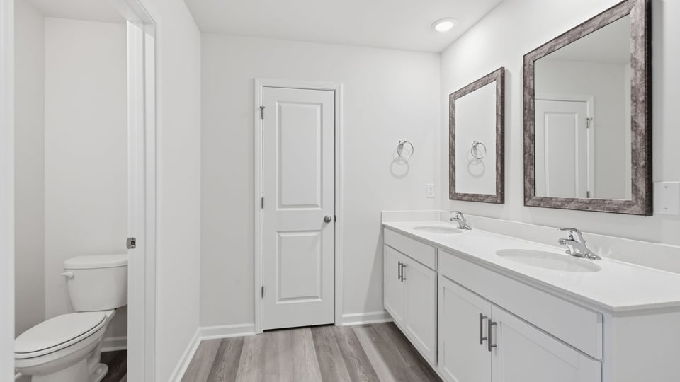 Bathroom with double vanity sink.
