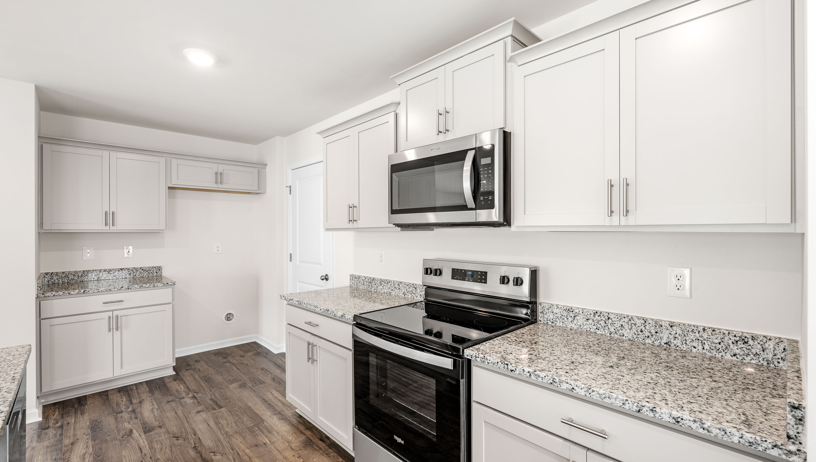 Kitchen with stainless steel appliances.