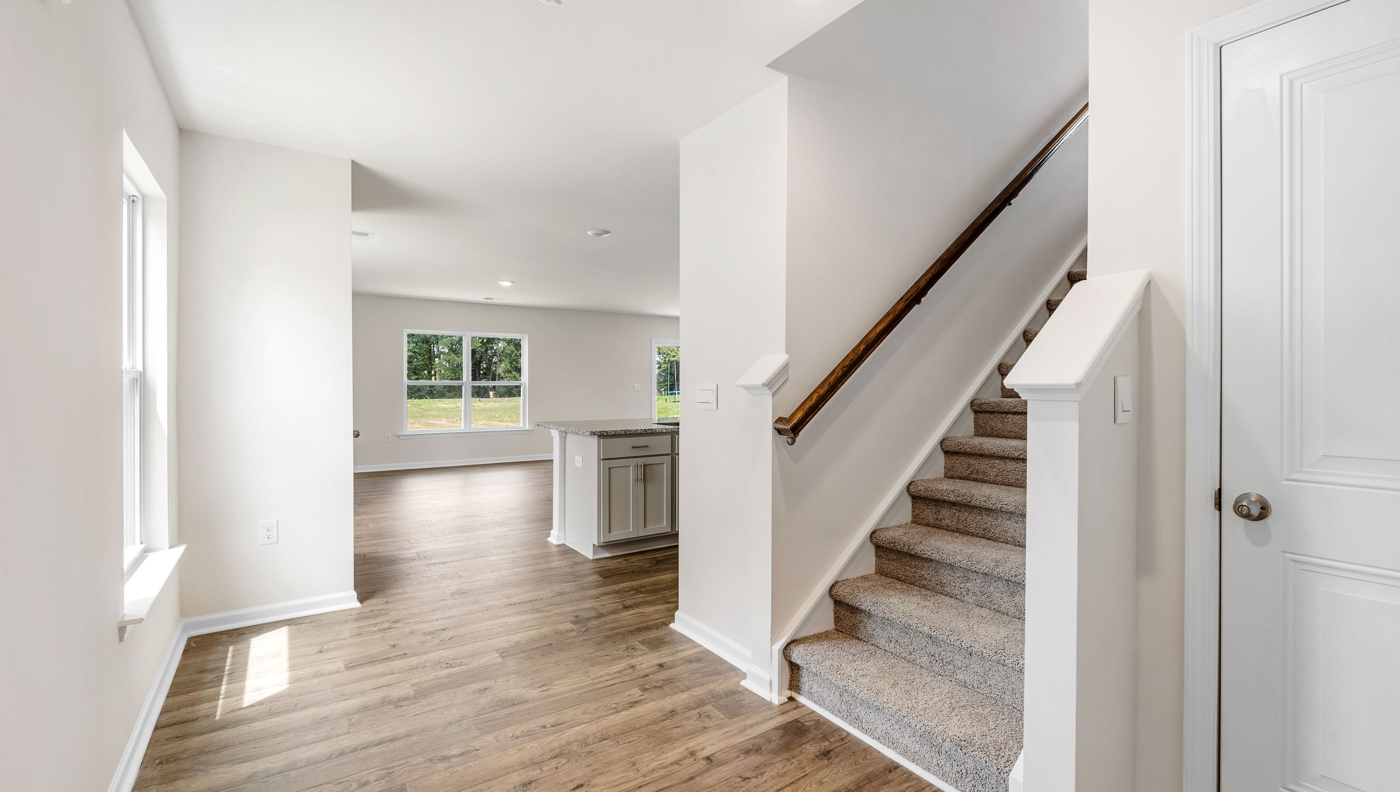 Hallway with view of family room.