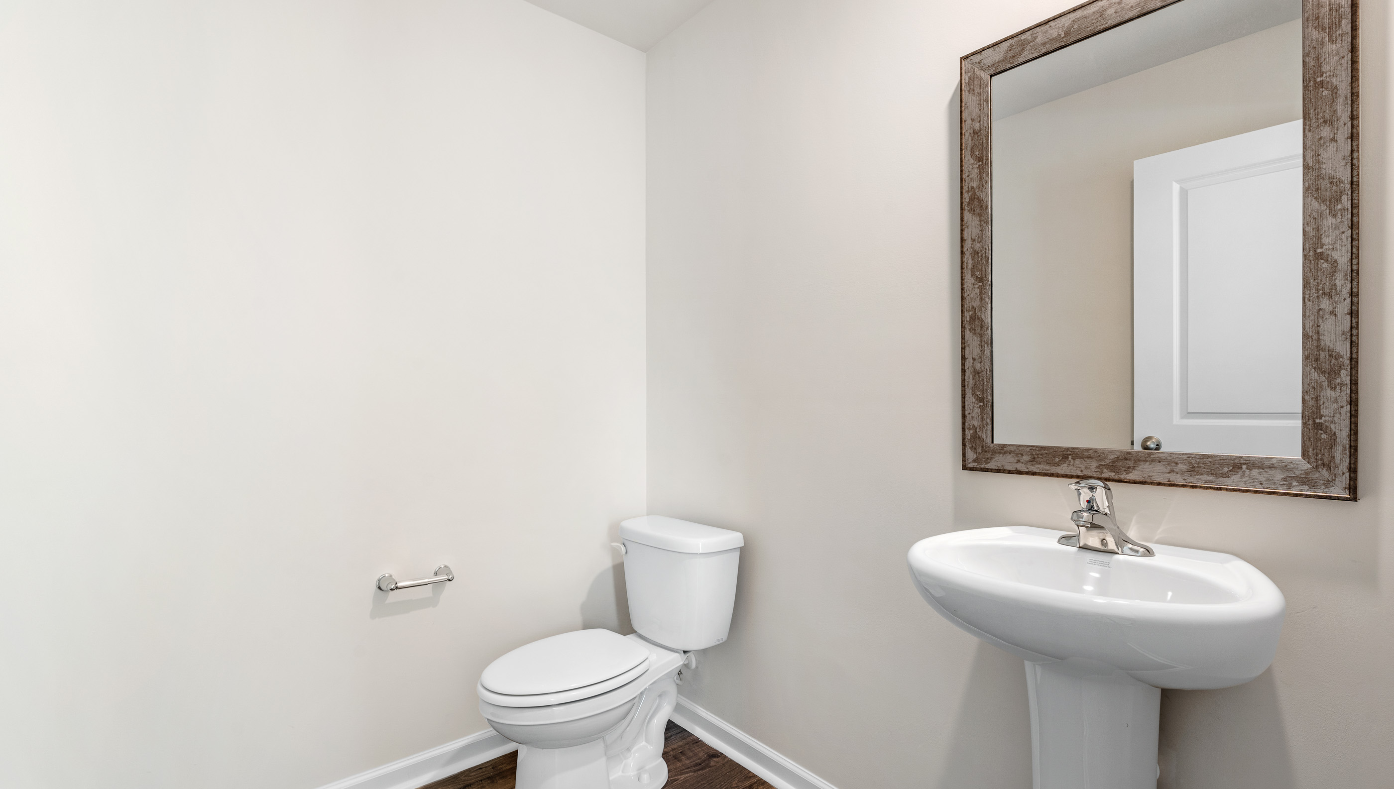 Bathroom with sink and toilet.