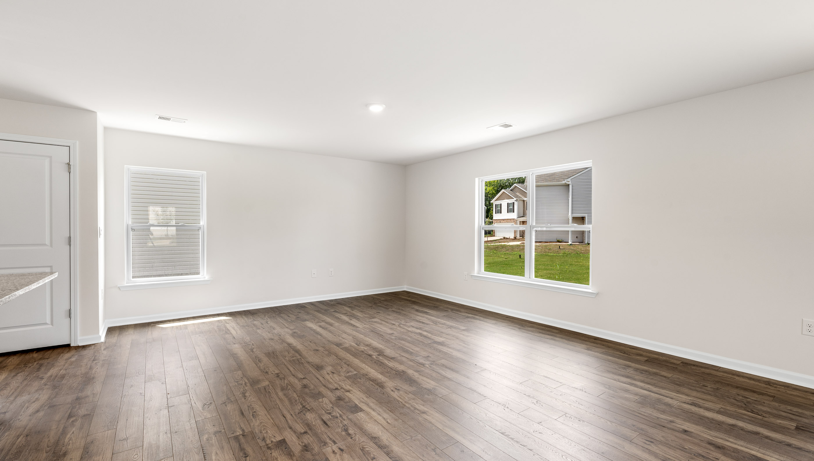 Family room with windows.