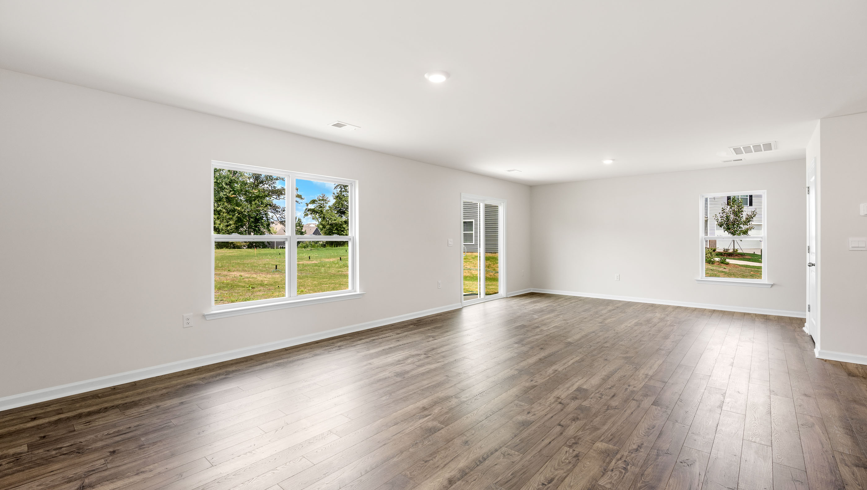 Family room with windows.